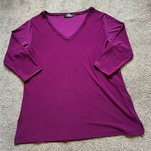 Woman’s purple 3/4 sleeves size 16